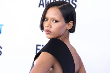 Taylor Russell wearing Loewe arrives at the 2023 Film Independent Spirit Awards held at the Santa Monica Beach on March 4, 2023 in Santa Monica, Los Angeles, California, United States. 