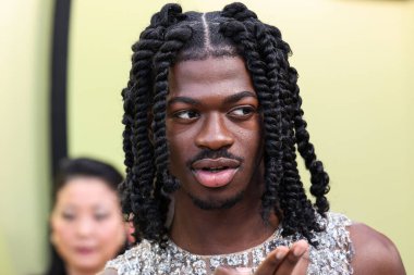 Amerikalı rapçi, şarkıcı ve söz yazarı Lil Nas X, 9 Mart 2023 'te Batı Hollywood, Los Angeles, Kaliforniya, ABD' de düzenlenen Versace Fall / Winter 2023 Moda Fuarı 'na geldi.. 