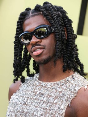 Amerikalı rapçi, şarkıcı ve söz yazarı Lil Nas X, 9 Mart 2023 'te Batı Hollywood, Los Angeles, Kaliforniya, ABD' de düzenlenen Versace Fall / Winter 2023 Moda Fuarı 'na geldi.. 