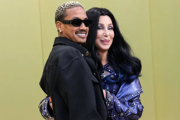 stock image Alexander Edwards and Cher arrive at the Versace Fall/Winter 2023 Fashion Show held at the Pacific Design Center on March 9, 2023 in West Hollywood, Los Angeles, California, United States.