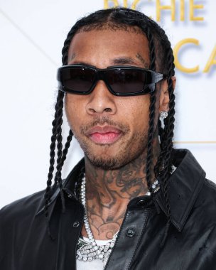 Amerikalı rapçi Tyga (Micheal Ray Stevenson), Darren Dzienciol ve Richie Akiva Oscar Partisi 2023 'te 10 Mart 2023' te Bel Air, Los Angeles, Kaliforniya, ABD 'de düzenlenen özel konuta geldi.. 