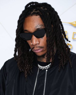 Amerikalı rapçi Wiz Khalifa (Cameron Jibril Thomaz), 10 Mart 2023 tarihinde Bel Air, Los Angeles, Kaliforniya, ABD 'de düzenlenen Darren Dzienciol ve Richie Akiva Oscar Partisi 2023' e geldi.. 