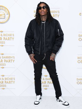 Amerikalı rapçi Wiz Khalifa (Cameron Jibril Thomaz), 10 Mart 2023 tarihinde Bel Air, Los Angeles, Kaliforniya, ABD 'de düzenlenen Darren Dzienciol ve Richie Akiva Oscar Partisi 2023' e geldi.. 