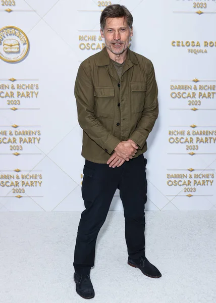 Danimarkalı aktör ve yapımcı Nikolaj Coster-Waldau, 10 Mart 2023 tarihinde Bel Air, Los Angeles, Kaliforniya, ABD 'de düzenlenen Darren Dzienciol ve Richie Akiva Oscar Partisi 2023' e geldi.. 