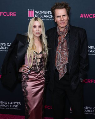 İngiliz rock grubu Duran Duran Duran 'dan Gela Nash-Taylor ve kocası / İngiliz müzisyen John Taylor, 16 Mart 2023' te Beverly Wilshire, A Four Seasons Hotel 'de düzenlenen The Women' s Cancer Research Fund 's An Unforgetable Evening Benefit Gala 2023' e geldiler. 