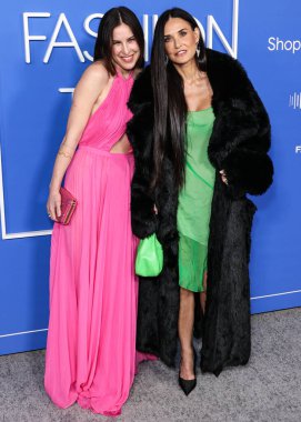 Scout LaRue Willis and mother Demi Moore arrive at the Fashion Trust U.S. Awards 2023 held at Goya Studios on March 21, 2023 in Hollywood, Los Angeles, California, United States.
