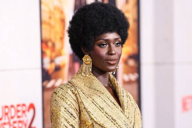 Schiaparelli giyimli İngiliz aktris ve model Jodie Turner-Smith, 28 Mart 2023 'te Westwood, Los Angeles, Kaliforniya, ABD' deki Regency Village Theatre 'da düzenlenen Netflix' in 'Murder Mystery 2' adlı filminin Los Angeles galasına geldi.. 