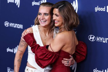 G Flip and girlfriend Chrishell Stause arrive at the 34th Annual GLAAD Media Awards Los Angeles held at The Beverly Hilton Hotel on March 30, 2023 in Beverly Hills, Los Angeles, California, United States.  clipart