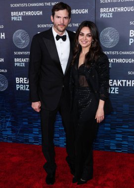 Ashton Kutcher ve eşi Mila Kunis, 15 Nisan 2023 'te ABD' nin Kaliforniya eyaletinin Los Angeles kentinde düzenlenen Akademi Sinema Müzesi 'nde düzenlenen 9..