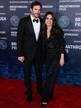 Ashton Kutcher ve eşi Mila Kunis, 15 Nisan 2023 'te ABD' nin Kaliforniya eyaletinin Los Angeles kentinde düzenlenen Akademi Sinema Müzesi 'nde düzenlenen 9..