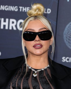 Amerikalı şarkıcı, söz yazarı, oyuncu ve televizyon kişiliği Christina Aguilera (Xtina), 15 Nisan 2023 'te ABD' nin Kaliforniya eyaletinin Los Angeles kentinde bulunan Akademi Sinema Filmleri Müzesi 'nde düzenlenen 9.