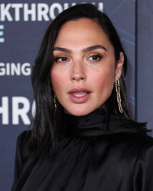 Tiffany & Co. 'nun takılarını takan İsrailli aktris ve manken Gal Gadot, 15 Nisan 2023' te ABD 'nin Kaliforniya eyaletinin Los Angeles kentinde bulunan Akademi Sinema Müzesi' nde düzenlenen 9.. 