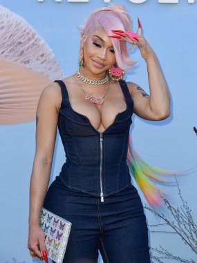 Saweetie arrives at the REVOLVE Festival 2023 celebrating the 20th Anniversary of REVOLVE in partnership with The h.wood Group on April 15, 2023 in Thermal, Coachella Valley, Riverside County, California, United States. clipart