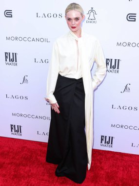 Givenchy giyimli Amerikalı aktris Elle Fanning, The Daily Front Row 'un 23 Nisan 2023' te Beverly Hills Hotel 'deki Crystal Garden' da düzenlenen 7. Moda Los Angeles Ödülleri 'ne ulaştı.. 