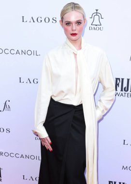 Givenchy giyimli Amerikalı aktris Elle Fanning, The Daily Front Row 'un 23 Nisan 2023' te Beverly Hills Hotel 'deki Crystal Garden' da düzenlenen 7. Moda Los Angeles Ödülleri 'ne ulaştı.. 