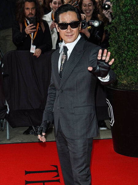 Ke Huy Quan departs The Mark Hotel for The 2023 Met Gala (2023 Costume Institute Benefit) Celebrating 'Karl Lagerfeld: A Line Of Beauty' at The Mark Hotel on May 1, 2023 in Manhattan, New York City, New York, United States. 