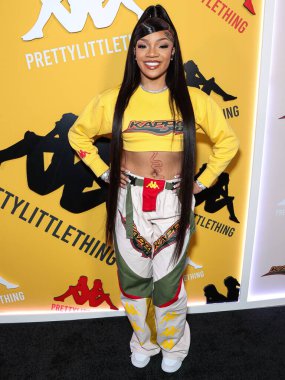 Amerikalı rapçi GloRilla (Gloria Hallelujah Woods), 9 Mayıs 2023 tarihinde Hollywood, Los Angeles, Kaliforniya, ABD 'de Sunset Room Hollywood' da düzenlenen PrettyLittleThing X Kappa Fırlatma Partisi 'ne geldi.