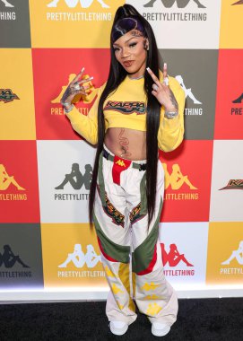 Amerikalı rapçi GloRilla (Gloria Hallelujah Woods), 9 Mayıs 2023 tarihinde Hollywood, Los Angeles, Kaliforniya, ABD 'de Sunset Room Hollywood' da düzenlenen PrettyLittleThing X Kappa Fırlatma Partisi 'ne geldi.