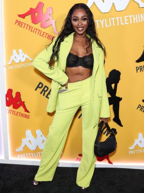 Trina Njoroge, 9 Mayıs 2023 'te Hollywood Sunset Room Hollywood' da düzenlenen PrettyLittleThing X Kappa Fırlatma Partisi 'ne geldi..