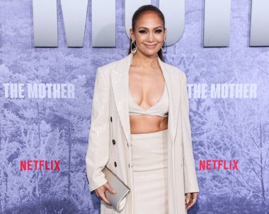 Jennifer Lopez (J.Lo, Jennifer Lynn Lopez-Affleck) wearing a custom Brunello Cucinelli look, a Tyler Ellis bag, and Fernando Jorge jewelry arrives at the Los Angeles Premiere Of Netflix's 'The Mother' on May 10, 2023 in Westwood, Los Angeles clipart