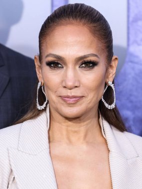 Jennifer Lopez (J.Lo, Jennifer Lynn Lopez-Affleck) wearing a custom Brunello Cucinelli look, a Tyler Ellis bag, and Fernando Jorge jewelry arrives at the Los Angeles Premiere Of Netflix's 'The Mother' on May 10, 2023 in Westwood, Los Angeles clipart