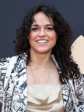 Michelle Rodriguez, 20 Mayıs 2023 'te Universal Stüdyoları Backlot' ta düzenlenen Charlize Theron Africa Yardım Projesine (CTAOP) ulaştı.. 
