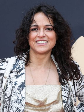 Michelle Rodriguez, 20 Mayıs 2023 'te Universal Stüdyoları Backlot' ta düzenlenen Charlize Theron Africa Yardım Projesine (CTAOP) ulaştı.. 