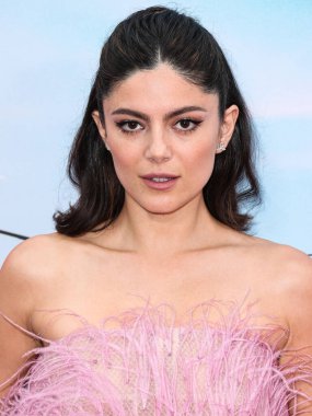 American actress Monica Barbaro wearing jewelry from Tiffany and Co. arrives at the Los Angeles Premiere Of Netflix's 'FUBAR' Season 1 held at AMC The Grove 14 on May 22, 2023 in Los Angeles, California, United States. clipart