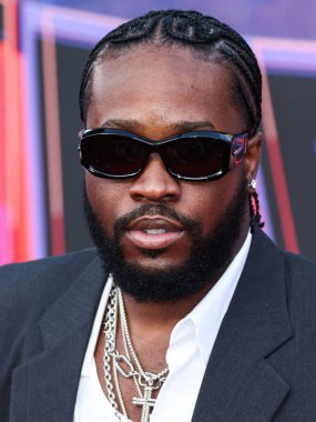 Amerikalı aktör, şarkıcı ve rapçi Shameik Moore, 30 Mayıs 2023 'te Westwood, Los Angeles, Kaliforniya, ABD' deki Regency Village Theater 'da düzenlenen Sony Pictures Animation' ın 'Örümcek Adam: Across the Spider Verse' adlı filminin dünya prömiyerine geldi..