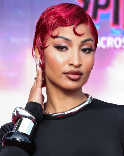 Shenseea, 30 Mayıs 2023 'te Westwood, Los Angeles, Kaliforniya' daki Regency Village Theater 'da düzenlenen Sony Pictures Animation' ın 'Örümcek Adam: Across the Spider Verse' adlı filminin dünya prömiyerine geldi.. 