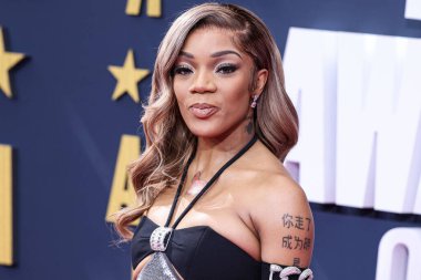 Amerikalı rapçi GloRilla (Gloria Hallelujah Woods), 25 Haziran 2023 tarihinde Los Angeles, Kaliforniya, ABD 'deki Microsoft Theater' da düzenlenen BET Ödülleri 'ne ulaştı.. 