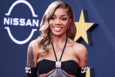 Amerikalı rapçi GloRilla (Gloria Hallelujah Woods), 25 Haziran 2023 tarihinde Los Angeles, Kaliforniya, ABD 'deki Microsoft Theater' da düzenlenen BET Ödülleri 'ne ulaştı.. 