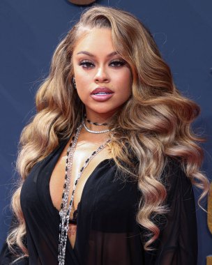 Amerikalı rapçi ve şarkıcı Latto (Alyssa Michelle Stephens), 25 Haziran 2023 tarihinde Los Angeles, Kaliforniya, ABD 'deki Microsoft Theater' da düzenlenen BET Ödülleri 'ne ulaştı.. 
