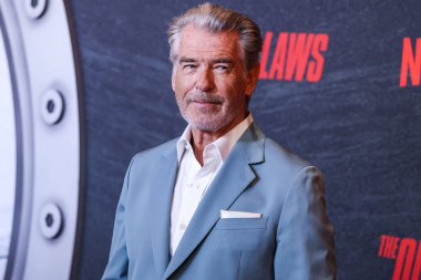 Irish actor and film producer Pierce Brosnan arrives at the Los Angeles Premiere Of Netflix's 'The Out-Laws' held at Regal LA Live on June 26, 2023 in Los Angeles, California, United States. clipart