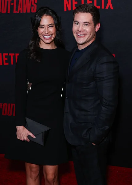 stock image Chloe Bridges and husband Adam DeVine arrive at the Los Angeles Premiere Of Netflix's 'The Out-Laws' held at Regal LA Live on June 26, 2023 in Los Angeles, California, United States.