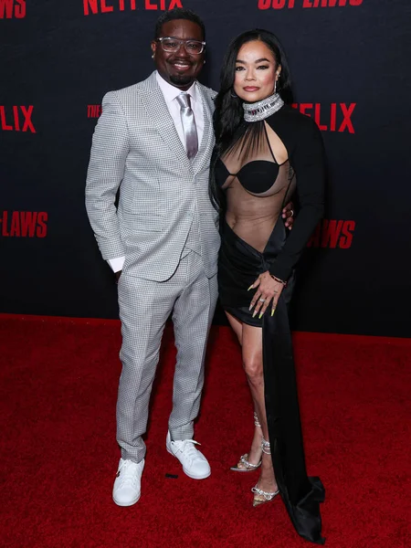 stock image Lil Rel Howery and girlfriend Dannella Lane arrive at the Los Angeles Premiere Of Netflix's 'The Out-Laws' held at Regal LA Live on June 26, 2023 in Los Angeles, California, United States.