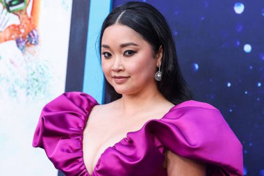 American actress and YouTuber Lana Condor wearing Christian Siriano arrives at the Los Angeles Premiere Of Universal Pictures And DreamWorks Animation's 'Ruby Gillman: Teenage Kraken' held at the TCL Chinese Theatre IMAX on June 28, 2023 in Hollywood clipart