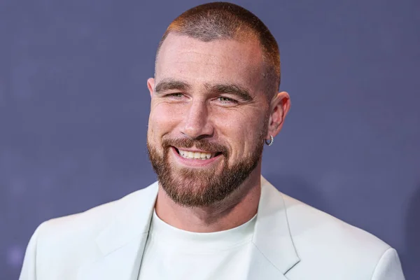 stock image American football tight end for the Kansas City Chiefs of the National Football League Travis Kelce arrives at the Los Angeles Premiere Of Netflix's 'Quarterback' Season 1 held at the Netflix Tudum Theater on July 11, 2023 in Hollywood, Los Angeles