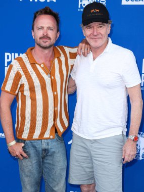 American actors Aaron Paul and Bryan Cranston arrive at Kershaw's Challenge 10th Annual Ping Pong 4 Purpose 2023 Charity Event Celebrity Tournament held at Dodger Stadium on July 27, 2023 in Elysian Park, Los Angeles, California, United States. clipart