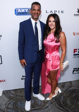 Andre Reed ve Cyndi Reed, 18 Ağustos 2023 'te Beverly Hilton Oteli' nde düzenlenen 23. Harold ve Carole Pompa Vakfı Galası 'na geldiler.