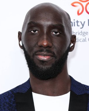 Senegalli profesyonel basketbolcu Tacko Fall, 18 Ağustos 2023 'te Beverly Hilton Oteli' nde düzenlenen 23. Harold ve Carole Pompa Vakfı galasına geldi.. 