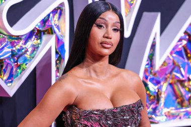 Cardi B wearing a Dilara Findikoglu dress arrives at the 2023 MTV Video Music Awards held at the Prudential Center on September 12, 2023 in Newark, New Jersey, United States.