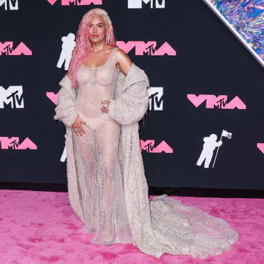 Karol G wearing Jacob and Co. jewelry arrives at the 2023 MTV Video Music Awards held at the Prudential Center on September 12, 2023 in Newark, New Jersey, United States.