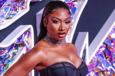 Brandon Blackwood elbisesi giyen Megan Thee Stallion ve Jacob ve Co. mücevherleri 12 Eylül 2023 'te Newark, New Jersey, ABD' deki Prudential Center 'da düzenlenen 2023 MTV Video Müzik Ödülleri' ne ulaştı..