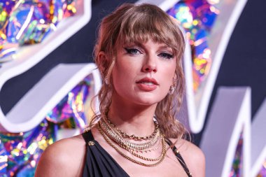 American singer-songwriter Taylor Swift wearing a Versace dress arrives at the 2023 MTV Video Music Awards held at the Prudential Center on September 12, 2023 in Newark, New Jersey, United States.
