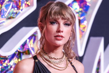 American singer-songwriter Taylor Swift wearing a Versace dress arrives at the 2023 MTV Video Music Awards held at the Prudential Center on September 12, 2023 in Newark, New Jersey, United States.