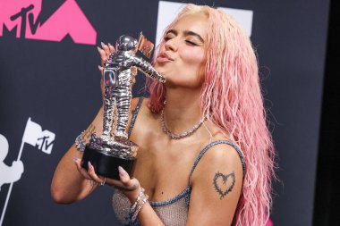Karol G poses with the Best Collaboration award for 'TQG' in the press room at the 2023 MTV Video Music Awards held at the Prudential Center on September 12, 2023 in Newark, New Jersey, United States.