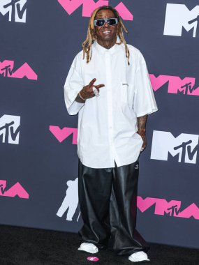 Lil Wayne, 12 Eylül 2023 tarihinde Newark, New Jersey 'de Prudential Center' da düzenlenen 2023 MTV Video Müzik Ödülleri 'nde basın odasında poz verdi..