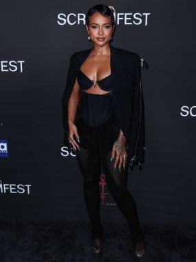 Amerikalı aktris ve model Karrueche Tran, 10 Ekim 2023 'te Hollywood, Los Angeles' taki TCL Çin Tiyatrosu IMAX 'te düzenlenen 23. Yıllık Korku Filmleri Festivali - Los Angeles Açılış Gecesi - Sümer Filmleri' İlahiyatının galası 'na geldi.