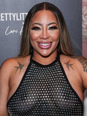 Amerikalı rapçi Hazel-E, 8 Kasım 2023 'te Batı Hollywood EDITION Hotel' deki Sunset at EDITION 'da düzenlenen PrettyLittleThing X Lori Harvey Party Wear Collection Launch' a geldi.